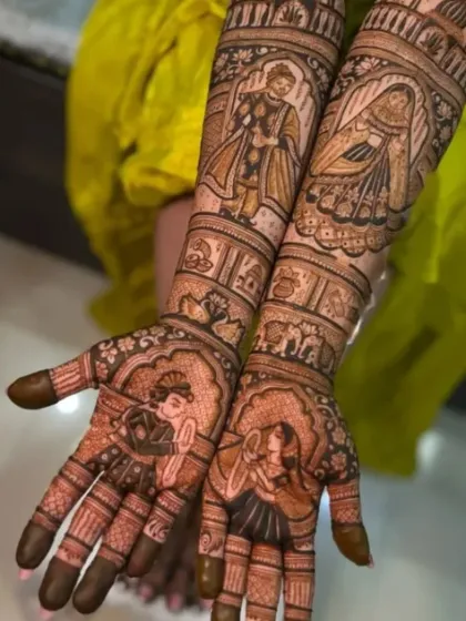 A close-up of a multi-figure bridal design, showing the level of detail in each portrait.