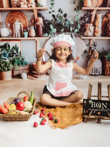 This big sister is ready to whip up something delicious in her chef-themed portrait session.