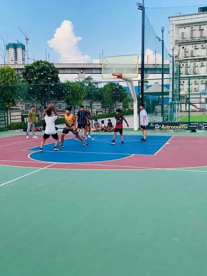A player takes a contested shot.