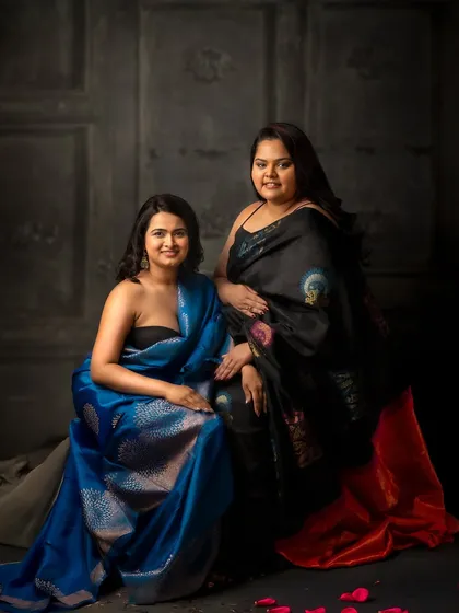 The saree is a symbol of modern elegance, and these two friends wear it with so much grace. This portrait captures their beautiful bond, as timeless and strong as the sarees they are draped in.