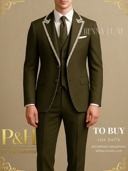 A detailed view of the olive green suit, focusing on the subtle yet impactful lapel embroidery.