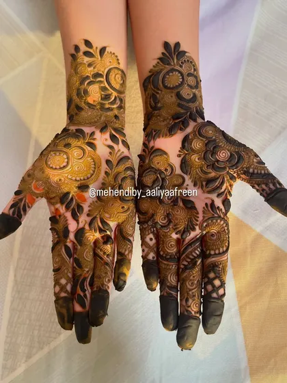 A gorgeous, dense design with a mix of floral and paisley elements, creating a rich and full look.