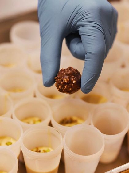 The making of our kulfi. Each one is carefully prepared in individual molds with high-quality ingredients to ensure the perfect flavor and texture in every bite.