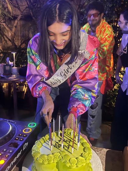 Celebrating my birthday behind the decks, of course. Cutting my cake mid-set is the perfect summary of my life.