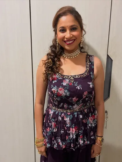 My client looking happy and confident. This fresh look is perfect for a long night of dancing and celebrating.