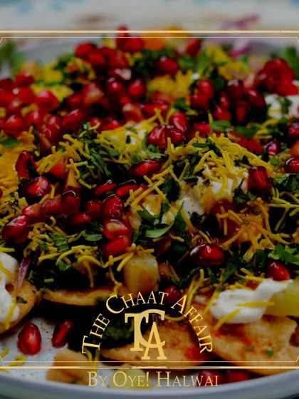 A vibrant plate of our Papdi Chaat, generously topped with fresh pomegranate seeds, sev, and our signature chutneys. We believe in using the freshest ingredients to create a perfect symphony of sweet, spicy, and tangy flavors in every bite.