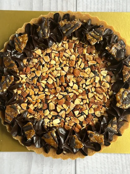 Even acclaimed film director Shoojit Sircar enjoyed my dark chocolate and almond tart! It's a testament to its irresistible combination of flavors and textures.
