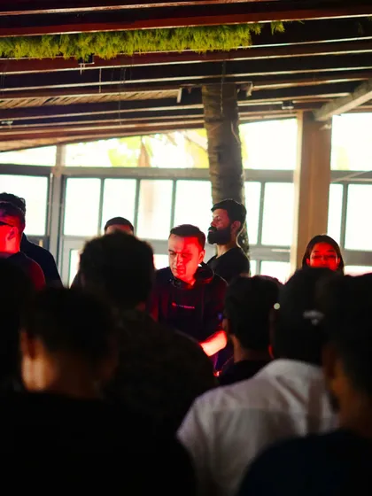 A view from the crowd at 9 Bar. The energy was electric, with everyone locked into the driving techno rhythm.