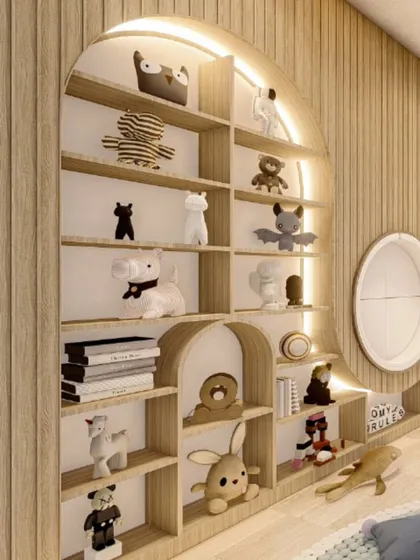 A detailed look at the custom arched shelving I designed for this child's room. The integrated backlighting turns a simple storage unit into a beautiful display for treasured toys and books.