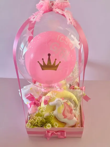 Another angle of the "It's a Girl" balloon hamper, showing the "It's a Girl" text on the balloon.