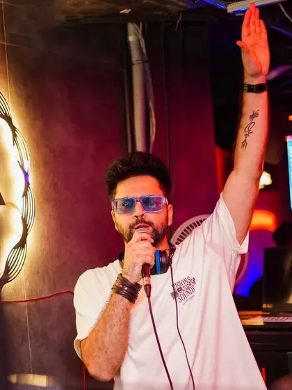 Suno gaur se duniya walo! I'm not shy on the mic. I'm here to hype you up, get you on the dancefloor, and make sure you're part of the story we're creating.