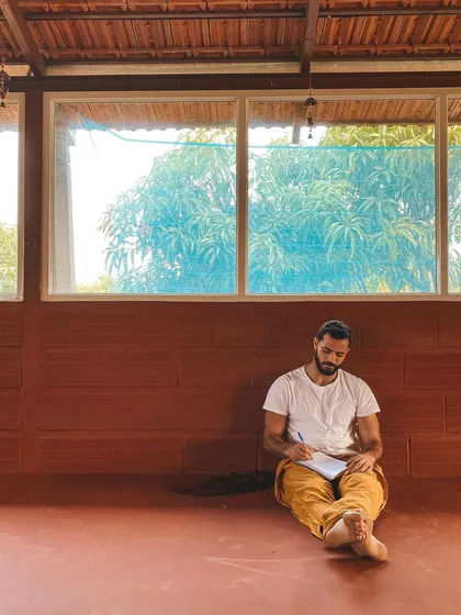 A student takes time for personal reflection and journaling. We encourage practices like this to help integrate the deep learning and experiences of ashram life.