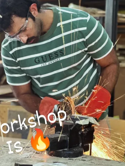 The workshop is on fire. This action shot captures the energy and excitement of learning a new, powerful skill like metal grinding.
