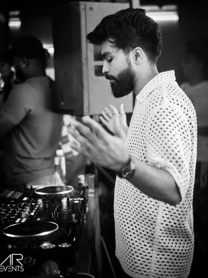 A black and white shot of me clapping, getting the crowd involved in the music.