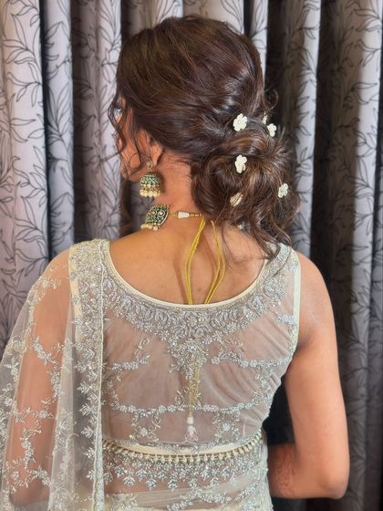 A back view of the messy updo, showing its beautiful, effortless-looking structure.