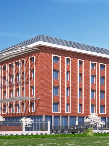 This architectural render shows a clean, institutional design with a rhythmic facade of red brick and vertical windows. The design is both modern and orderly, suitable for an educational setting.