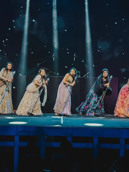 They are not typical bridesmaids, they are her women of awesomeness. For this performance, we used microphones as props for a fun, retro-themed routine that was full of sass and style.