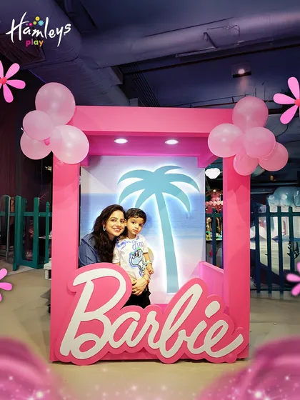 Strike a pose! Our Barbie-themed events feature fun photo opportunities like this life-sized Barbie box, perfect for capturing magical memories with your little one.