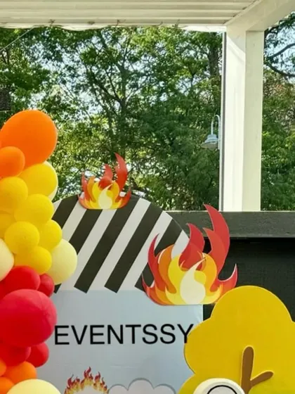 More details of the flame and caution-striped props that make the firetruck theme so engaging.