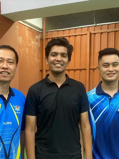 Me with our dedicated visiting coaches, Julius Esposo and Alex, who contribute to our players' success.