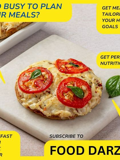 Too busy to plan your meals? We've got you covered with breakfast, lunch, snack, and dinner. This healthy mini pizza is just one of the many delicious options you can get.