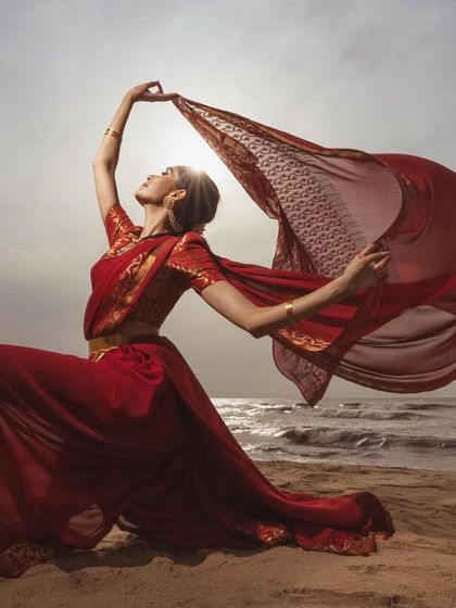A collaboration with photographer Amar Ramesh, weaving dance with a beautiful red saree from Studio 149. The sun and the flowing fabric create a truly magical effect.