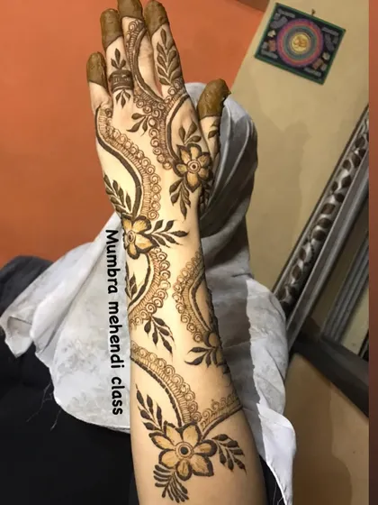 A full-arm view of the Doha design. You can see how the pattern creates a beautiful, flowing look from hand to elbow.