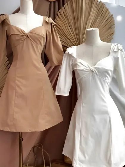 A classic A-line dress is always in style. I designed these custom mini dresses with feminine puff sleeves and a sweetheart neckline, tailored for a flattering fit. I can create these made-to-measure dresses in a variety of fabrics and colors to match your personal style.