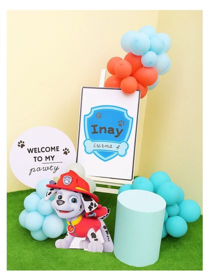 A 'Welcome to my Pawty' sign for Inay's 4th birthday. This cute entrance detail features a Marshall cutout and balloons in the classic Paw Patrol colors.