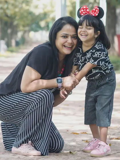 The best moments are the ones you don't pose for. My goal during a family shoot is to capture the real connection and joy, like this beautiful, candid laugh between a mother and her daughter during an outdoor session.