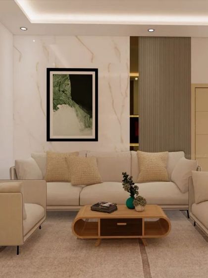 A minimalist living room with a neutral color palette, featuring a comfortable sofa set and abstract art. The design is clean, modern, and uncluttered.