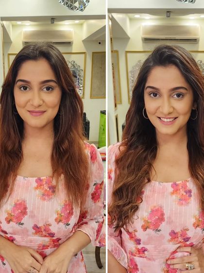 This client's smile says it all. We added length and soft waves, giving her a glamorous new look that radiates confidence.