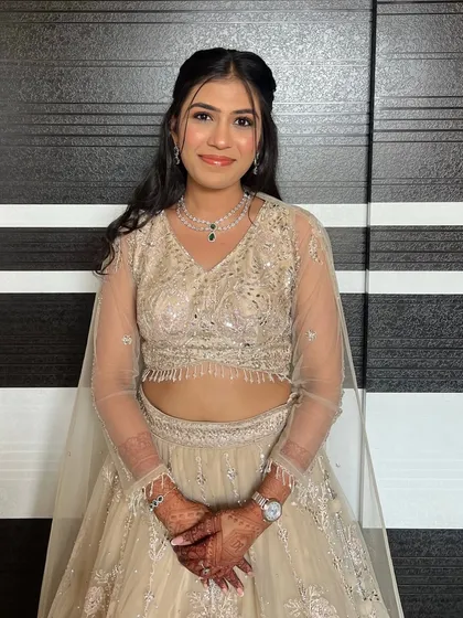 Just the right amount of glam. This look in a cream lehenga is perfect for someone who wants to look special without heavy makeup.
