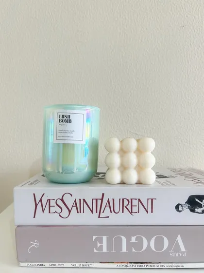 Our Lush Bomb holographic jar candle paired with a mini bubble candle. A perfect combination of scented and sculptural decor.
