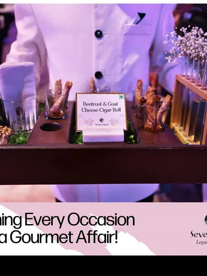 Turning every occasion into a gourmet affair. A server presents our Beetroot & Goat Cheese Cigar Rolls on a specially designed tray, showcasing our commitment to elegant service.