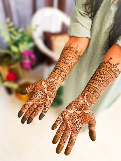 A full bridal design with a city skyline incorporated on the arms, a modern twist on a classic look.