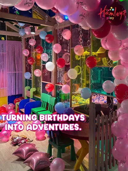 I believe in turning birthdays into grand adventures. This photo showcases a beautifully decorated party space, filled with balloons and vibrant colors, ready to welcome the birthday star and their friends.