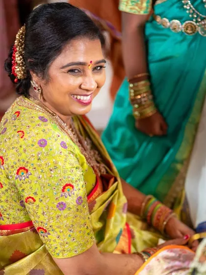 A duplicate of image 203, showing the beautiful mother of the bride in her custom embroidered blouse.