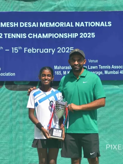 A moment with the coach after a big final. Trisha and I after her runner-up finish at the U12 Nationals. Every final, win or lose, is a step forward.