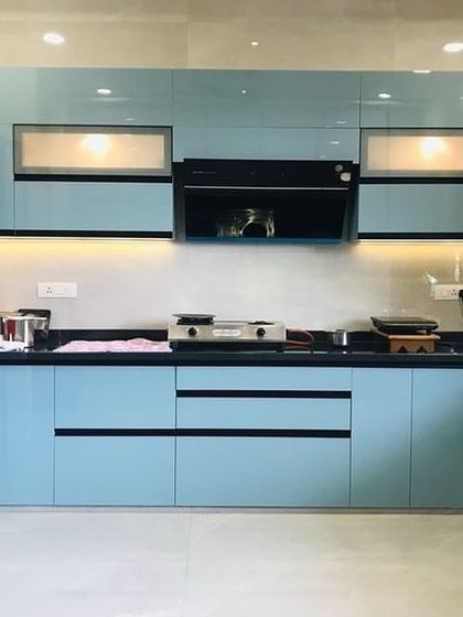 Dhanjal Interiors - Turnkey Modular Kitchens Modern & Sleek Kitchens photo 13