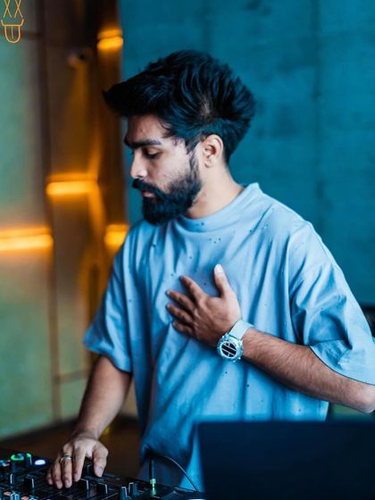 A thoughtful moment at the decks at The Fixx Bar. It's not all high energy; there's a lot of focus and concentration too.