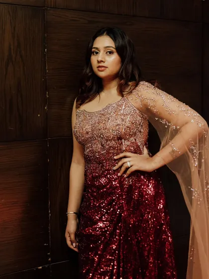 A powerful pose showing off the starry reception makeup. The look is designed to be dramatic yet elegant, perfect for an evening celebration.