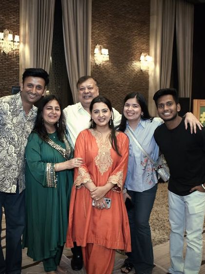 A picture with the happy family during rehearsals. We become a part of the family during the process, ensuring everyone is comfortable and confident.