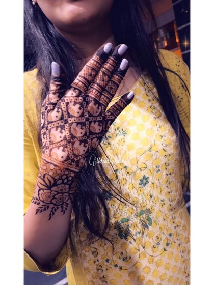 Another view of the elephant checkerboard mehendi, this time on the back of the hand. It's a fun and eye-catching design.