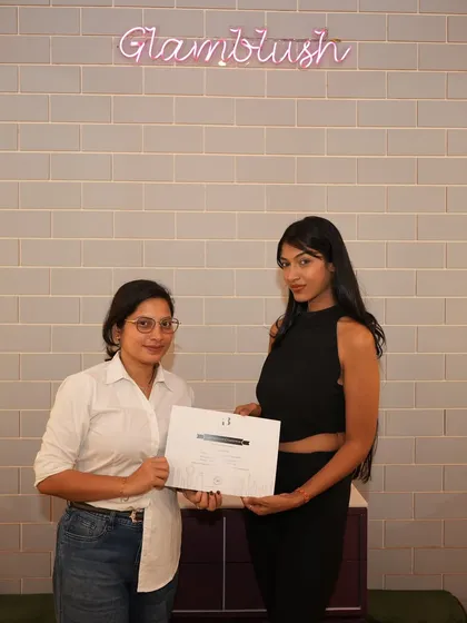 Our founder Vishakha presenting a certificate to a proud graduate. We take great pride in mentoring each student and celebrating their success as they embark on their new careers.