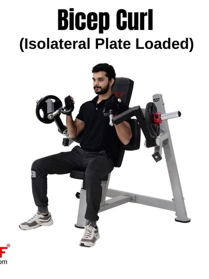 A user at the peak of a bicep curl, showing the full contraction this machine enables.