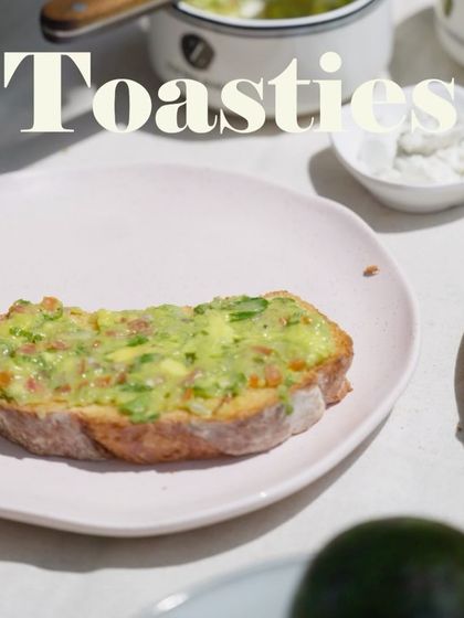 Simplicity at its best. A single slice of our avocado toastie, showcasing the fresh, vibrant green of the guacamole on a perfectly toasted slice of bread.