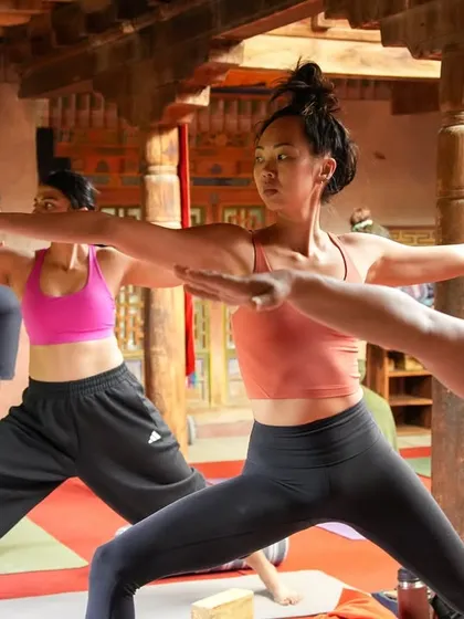 The power of community. A moment from my Ladakh retreat, with everyone moving together in Virabhadrasana II (Warrior II), held by the energy of the group and the mountains.