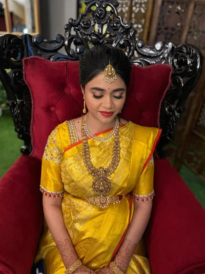 Another angle of the baby shower makeup, highlighting the flawless base and the beautiful red lip colour.