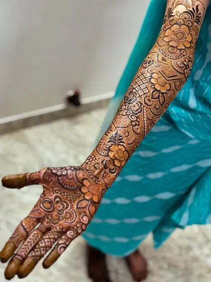 The complete arm view, showing how all the floral elements come together to create a stunning bridal sleeve.
